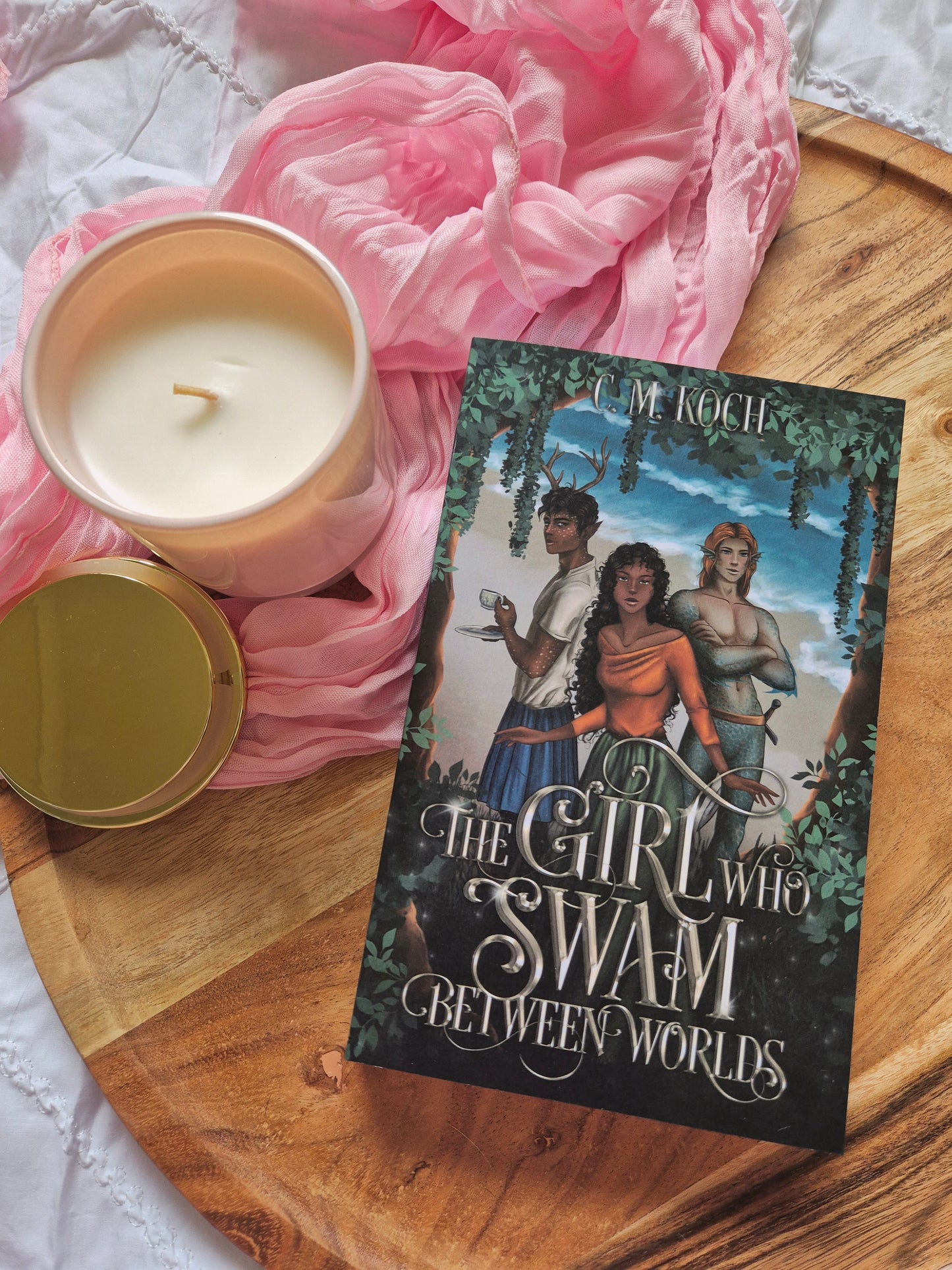 The Girl Who Swam Between Worlds by C.M. Koch