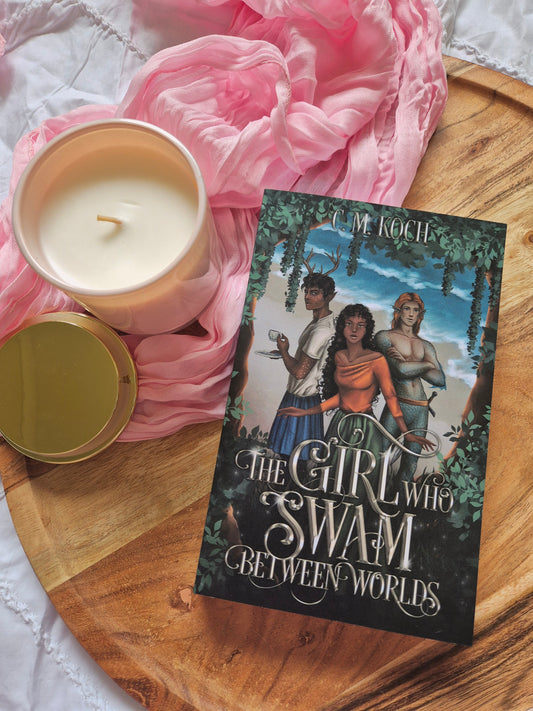 The Girl Who Swam Between Worlds by C.M. Koch
