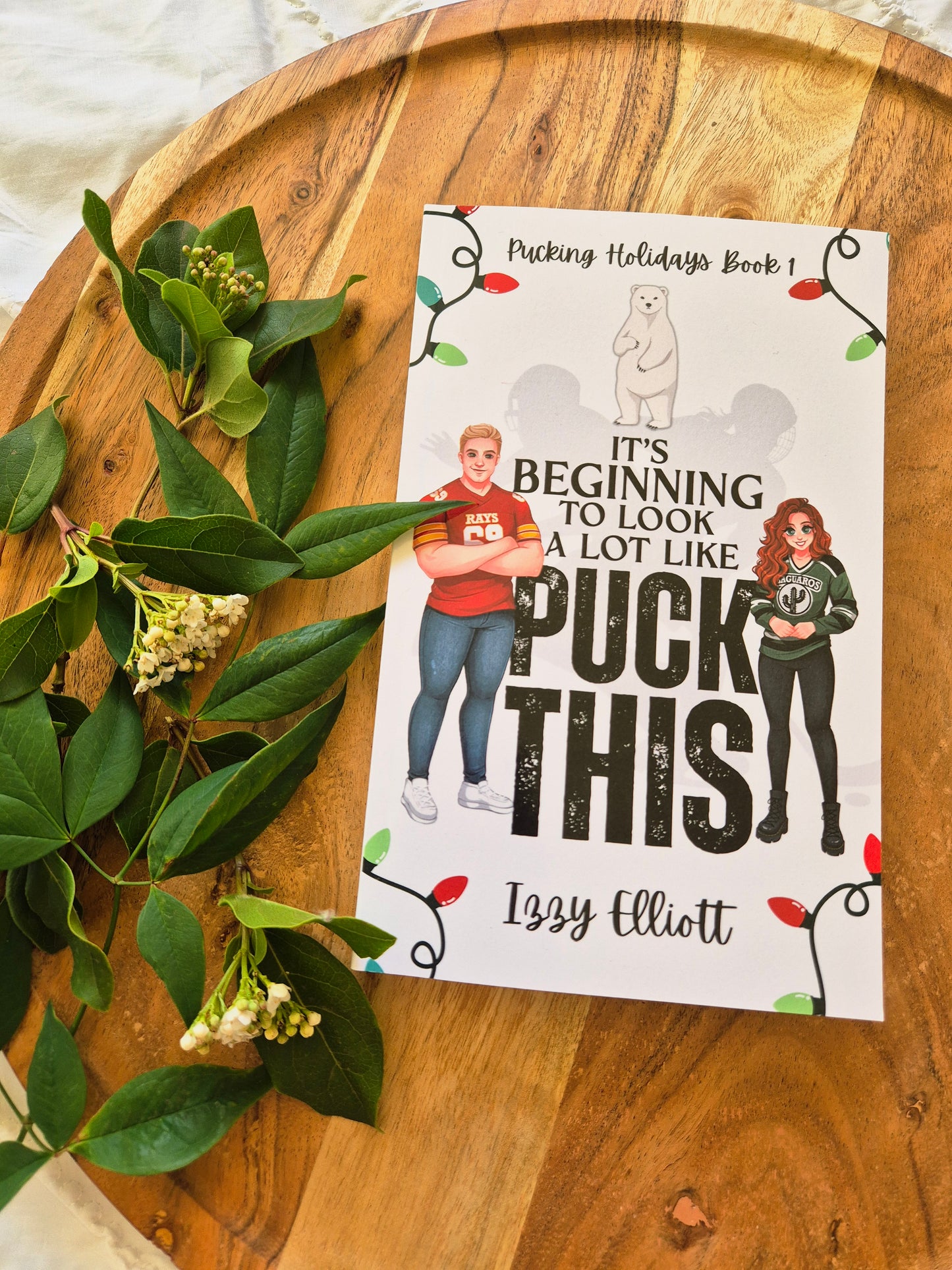 It's Beginning To Look A Lot Like Puck This by Izzy Elliot (Pucking Holidays book 1)